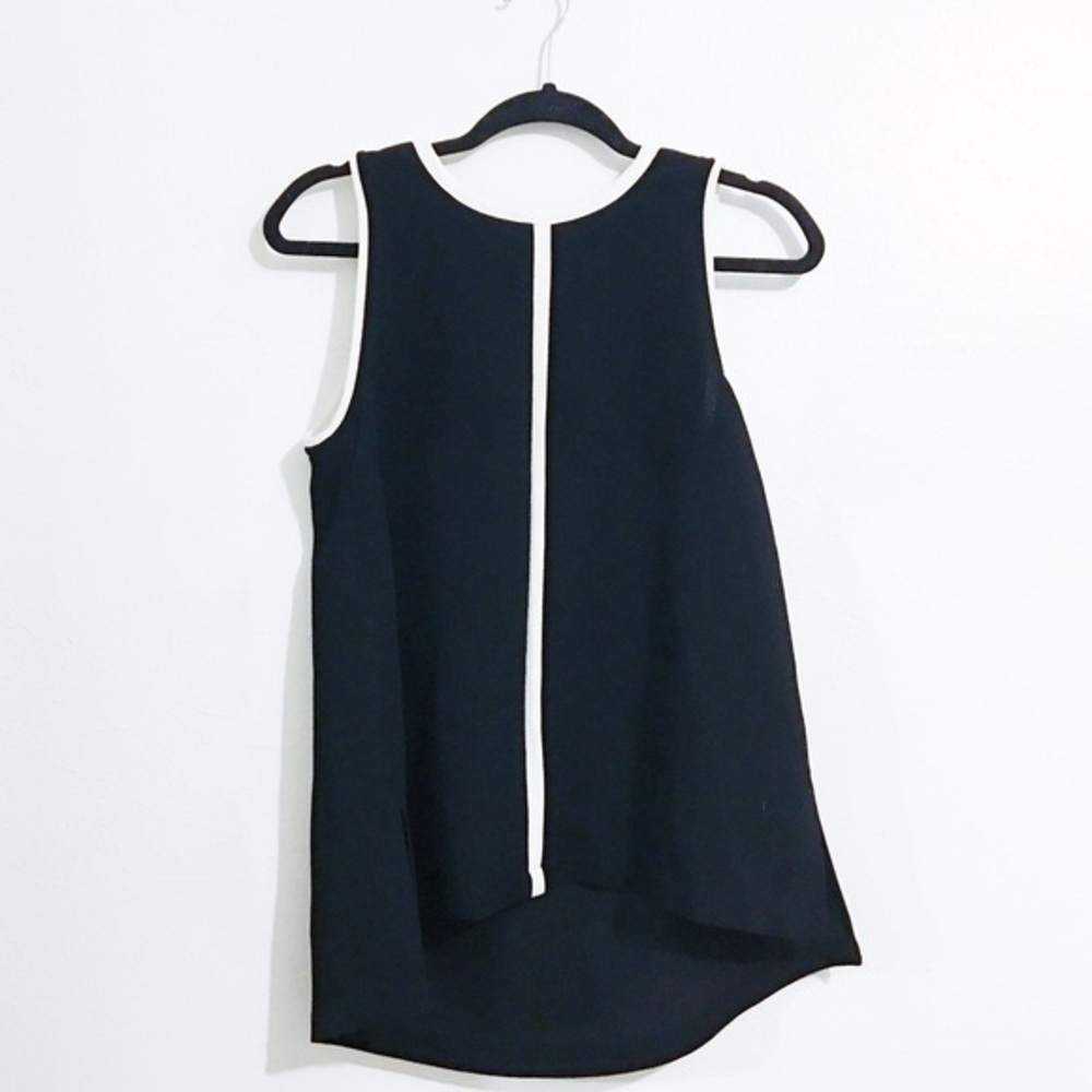 NWOT black sleeveless blouse with white lines